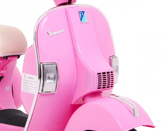 vespa elettrica per bambini rosa con ruote ausiliarie e audio