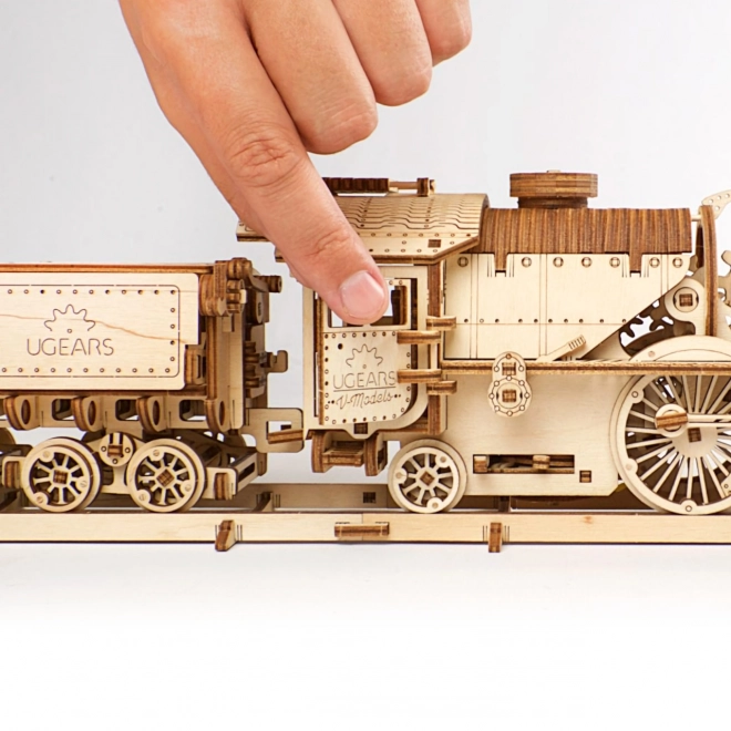 Locomotiva a tender meccanici in legno 3D Ugears