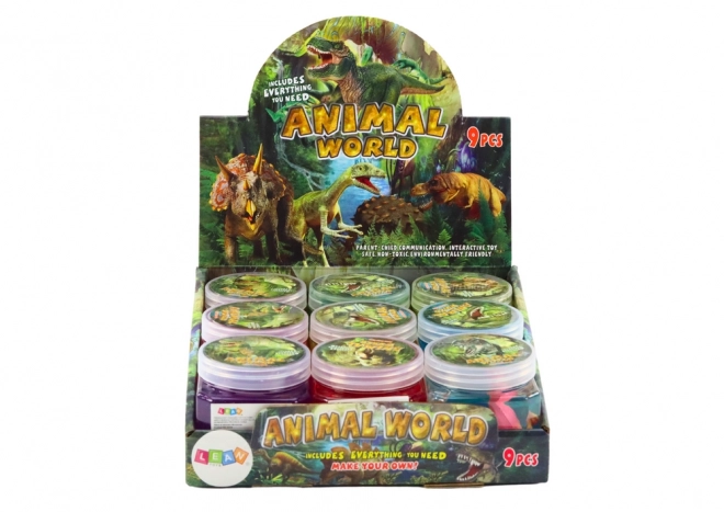 Slime in barattolo con figurine di dinosauri