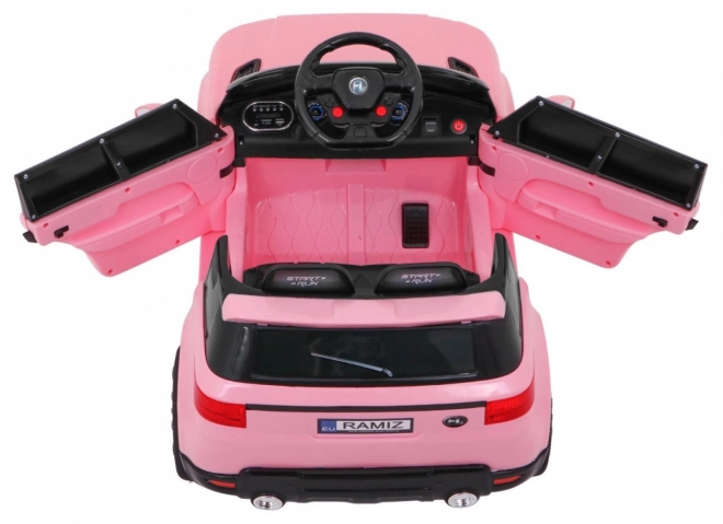 Auto elettrica per bambini rosa con radiocomando e funzioni di sicurezza