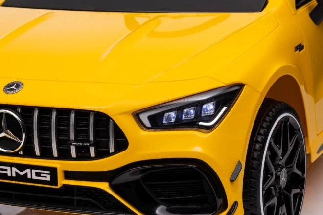 Auto elettrico per bambini Mercedes CLA 45s AMG giallo 4x4