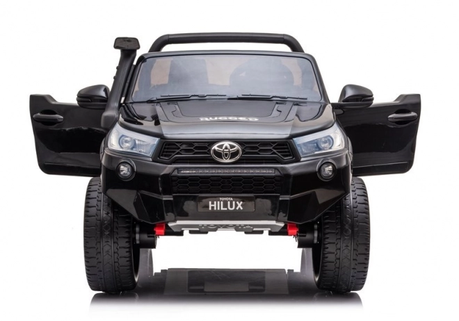 Auto elettrico per bambini Toyota Hilux bianco – Nera