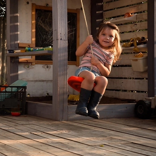 Altalena da giardino circolare in plastica per bambini