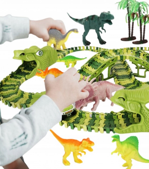 Pista da corsa di dinosauro con macchinina e figurine