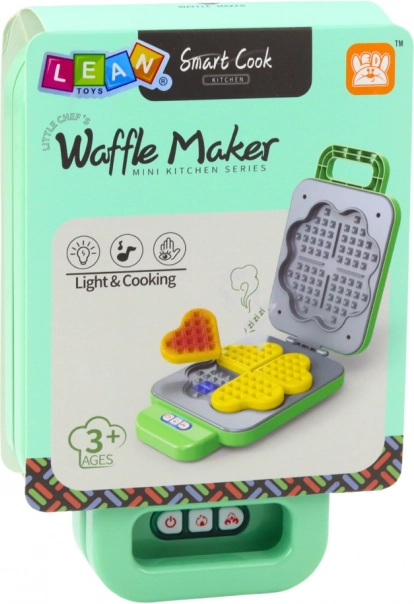 Giocattolo per bambini piastra per waffle a batteria con effetti luminosi verde