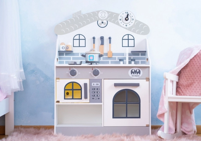 Cucina in legno grigia con luce e accessori per bambini