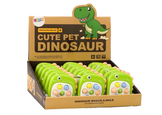 Gioco di abilità Colpi di talpa con lettere dinosauro verde