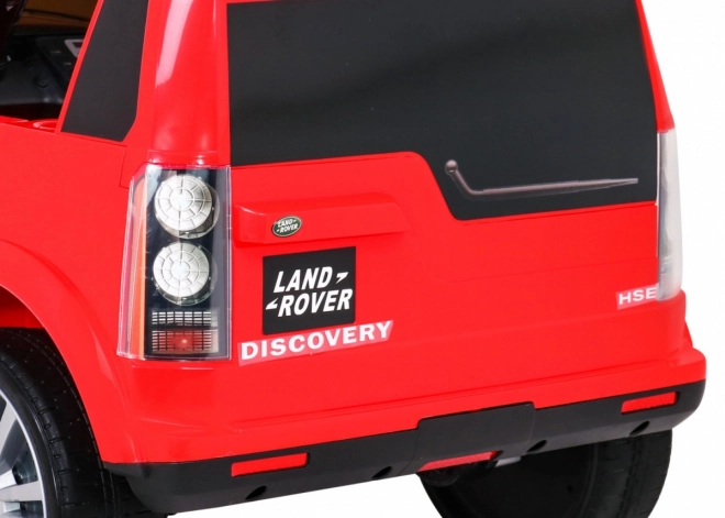Land Rover Discovery Macchinina elettrica per bambini rossa + telecomando + ruote in EVA + avvio lento + radio MP3