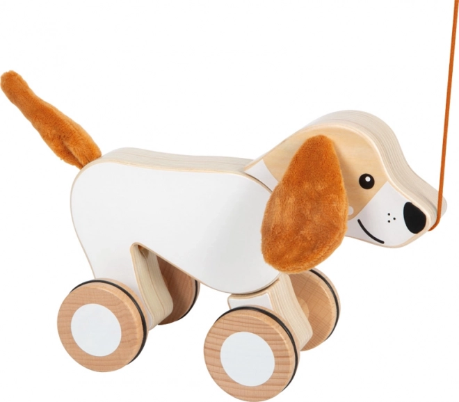 Giocattolo trainabile in legno Cagnolino con orecchie fruscianti