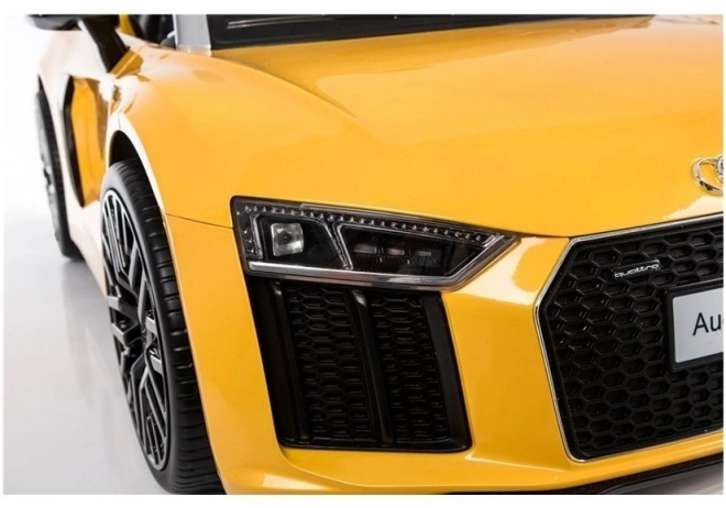 Auto elettrico per bambini Audi R8 Spyder giallo