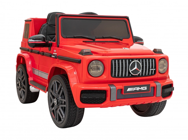 Mercedes AMG G63 per bambini Rosso + telecomando + MP3 LED + avvio lento + EVA + cinture