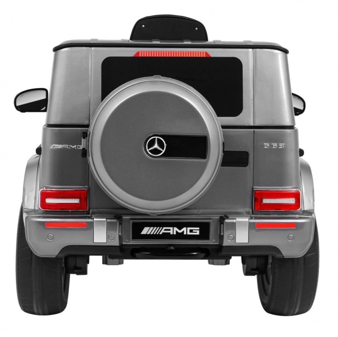 Mercedes AMG G63 per bambini Vernice argento + telecomando + MP3 LED + avvio lento + EVA + cinture