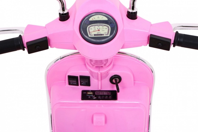 vespa elettrica per bambini rosa con ruote ausiliarie e audio