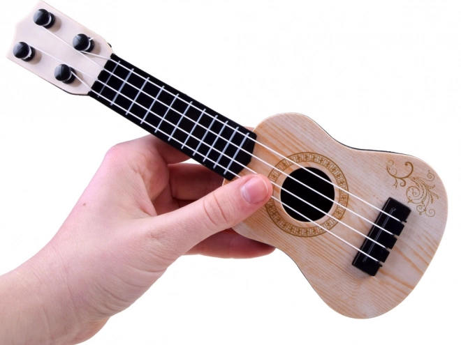 Mini chitarra ukulele per bambini