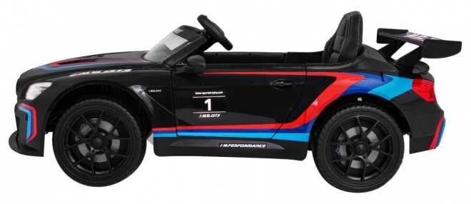 BMW M6 GT3 Auto a batteria per bambini nero + ventilazione + suoni MP3 Luci + telecomando