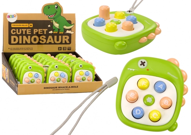 Gioco di abilità Colpi di talpa con lettere dinosauro verde