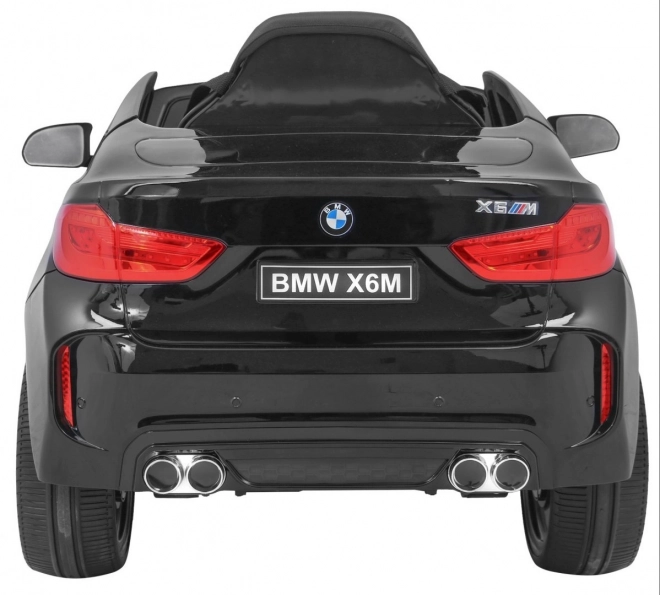 Auto elettrico per bambini BMW X6M nero + telecomando + EVA + avvio lento + pannello audio + LED
