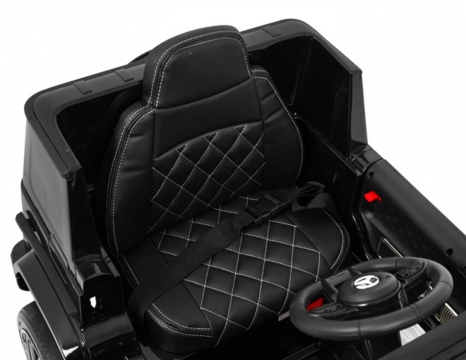 Mercedes AMG G63 per bambini Laccato nero + telecomando + MP3 LED + partenza lenta + EVA + cinture