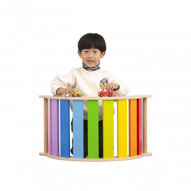 Ponte a dondolo in legno color arcobaleno Montessori di Viga