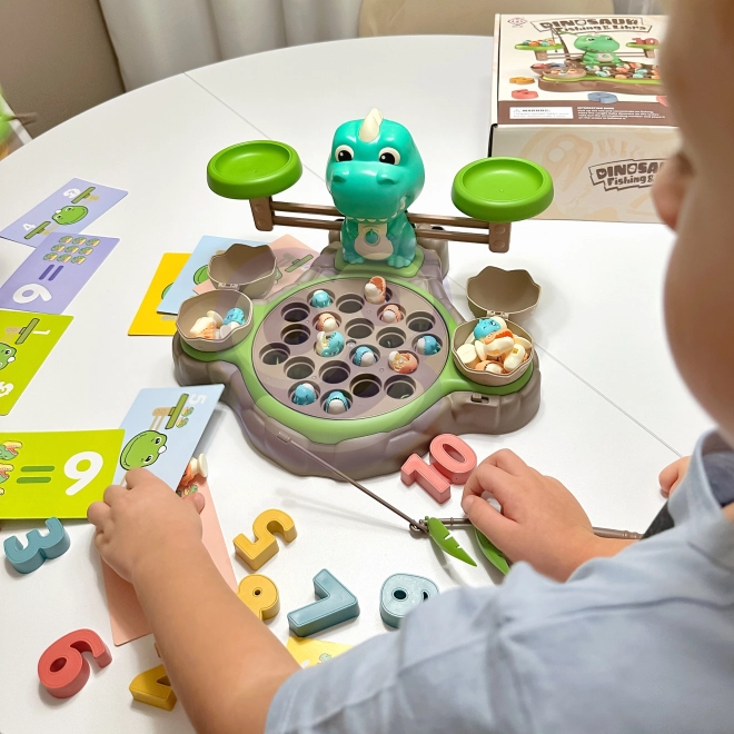 Gioco educativo Dinozaur con bilancia e cattura di WOOPIE