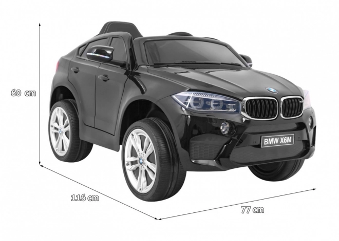 Auto elettrico per bambini BMW X6M nero + telecomando + EVA + avvio lento + pannello audio + LED