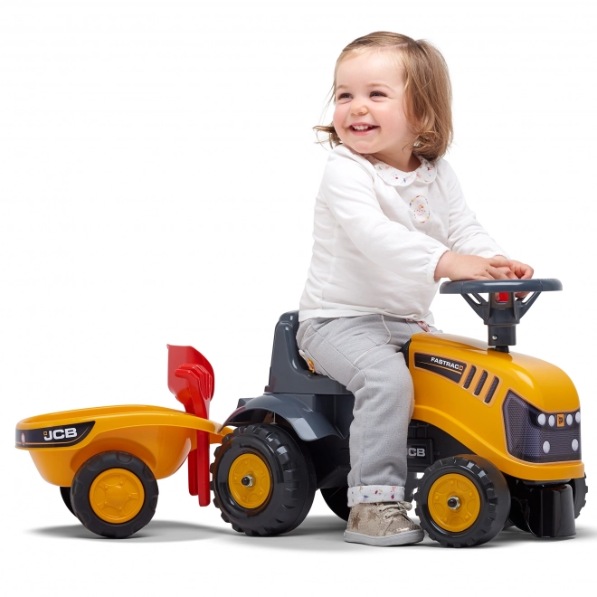 Odrážedlo Baby JCB giallo con rimorchio e pala