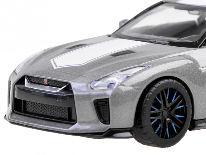 Auto in metallo Nissan GT-R 1:32 con porte apribili