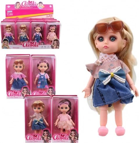 Bambola con occhiali per bambini