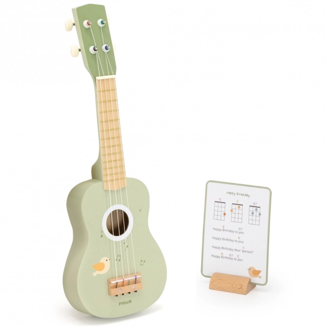 Ukulele in legno per bambini verde con spartiti