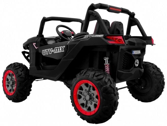 Macchina per bambini UTV-MX nera 4x4 con MP4, telecomando e illuminazione LED