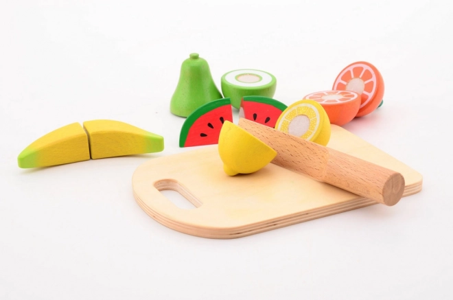 Frutta in legno con tagliere e coltello