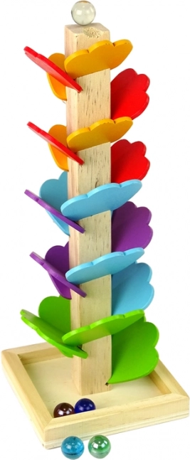 Scorrimento fluido delle biglie sulle foglie colorate