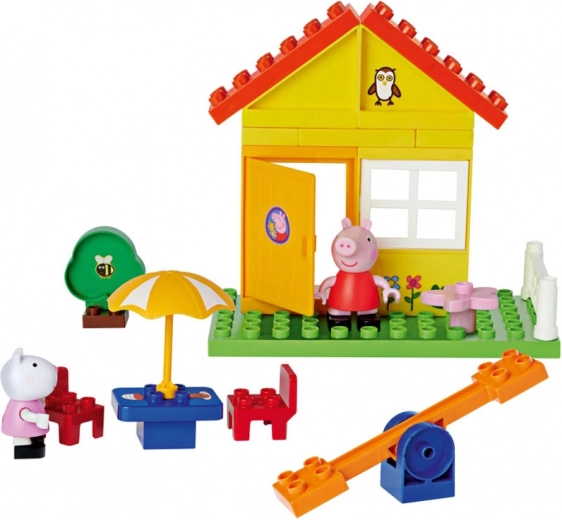 Casetta con parco giochi per storie dal mondo di Peppa