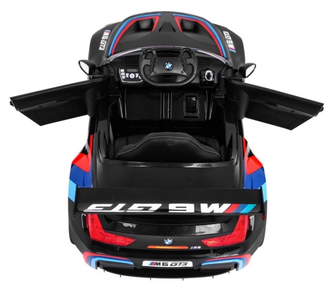 BMW M6 GT3 Auto a batteria per bambini nero + ventilazione + suoni MP3 Luci + telecomando