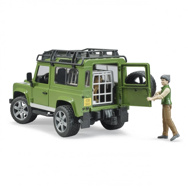 Land Rover Defender con Figurine Cacciatore e Cane di Bruder