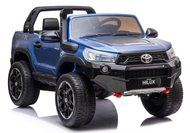 Auto elettrico per bambini Toyota Hilux bianco – Blu