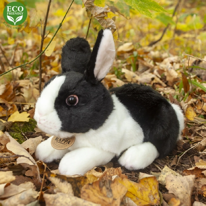 Coniglio peluche bianco e nero sdraiato eco-friendly