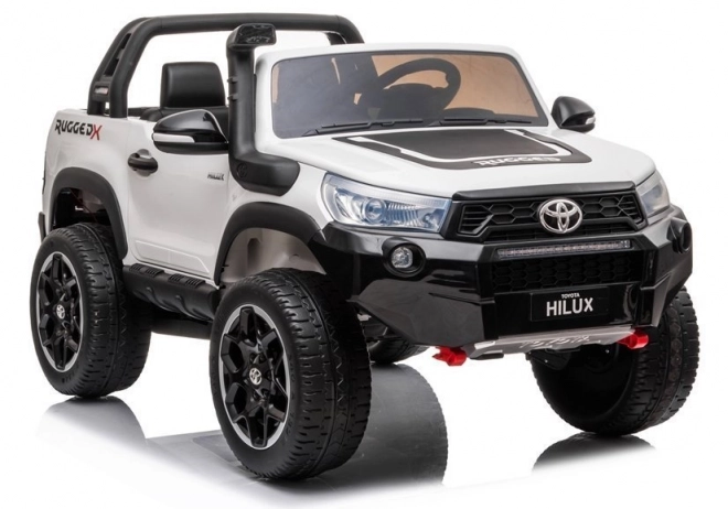 Auto elettrico per bambini Toyota Hilux bianco