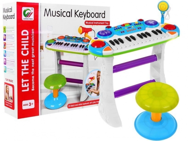 Set musicale azzurro tastiera con tamburi e microfono per bambini 3+ con luci e suoni