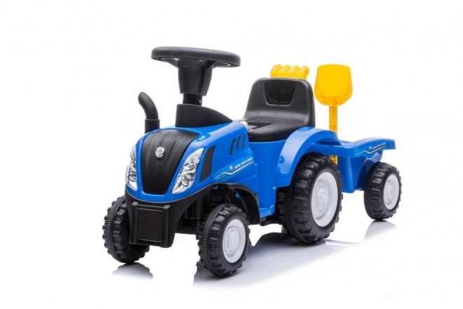 Trattore cavalcabile New Holland blu