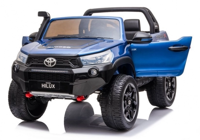 Auto elettrico per bambini Toyota Hilux bianco – Blu