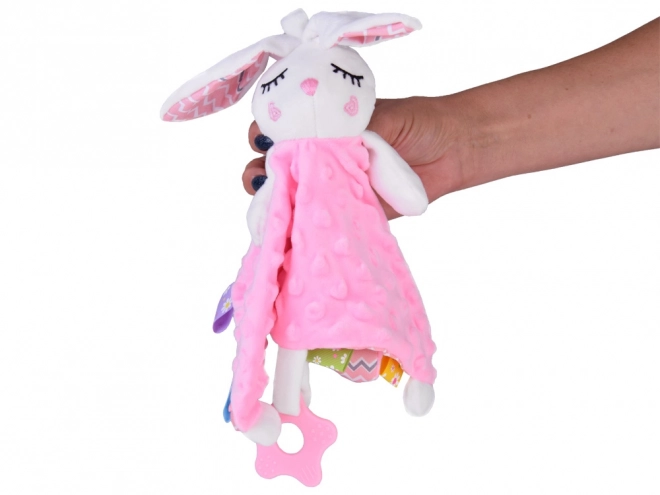 Elefantino di peluche con etichette e massaggiagengive