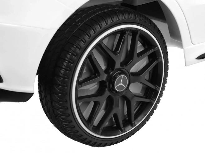 Auto elettrico per bambini Mercedes AMG CLA 45s con effetto dondolo – Bianco