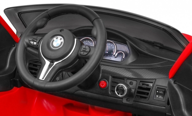 BMW X6M Auto elettrico per bambini rosso + telecomando + EVA + avvio lento + pannello audio + LED