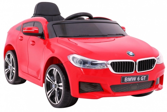 BMW 6 GT Auto a batteria rosso + telecomando + partenza lenta + EVA + cinture + LED MP3