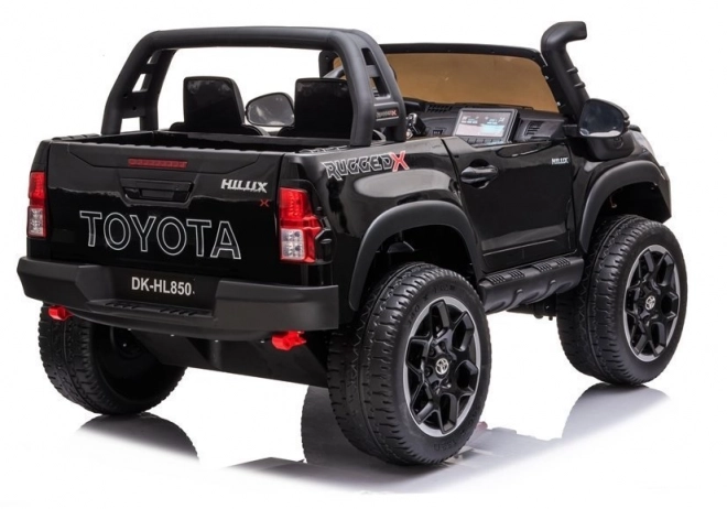 Auto elettrico per bambini Toyota Hilux bianco – Nera