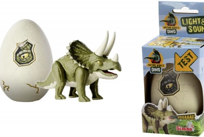 Figura di dinosauro luminoso nell'uovo