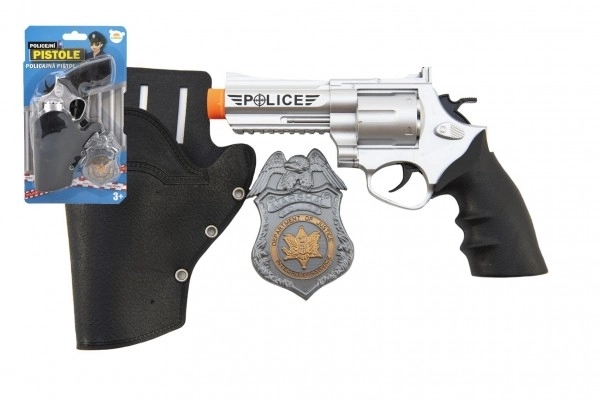 Pistola della polizia con fondina e distintivo