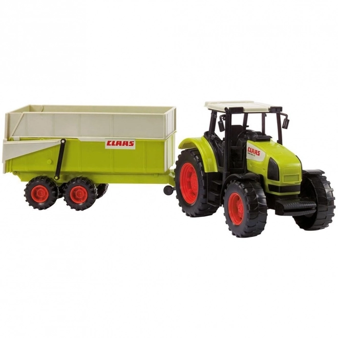 Trattore Claas Ares con rimorchio inclinabile