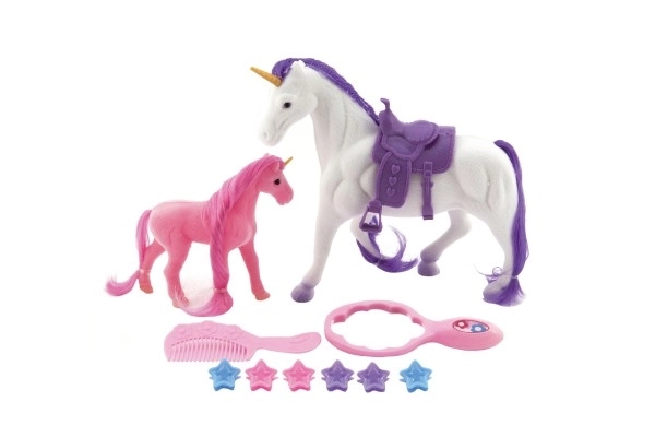 Unicorno con sella e puledro in plastica con accessori